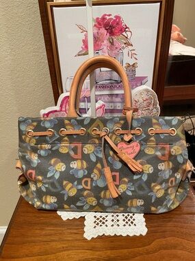 Dooney & Bourke Black Bee Print Tote with Tan Leather Handles and Pink Heart Tag